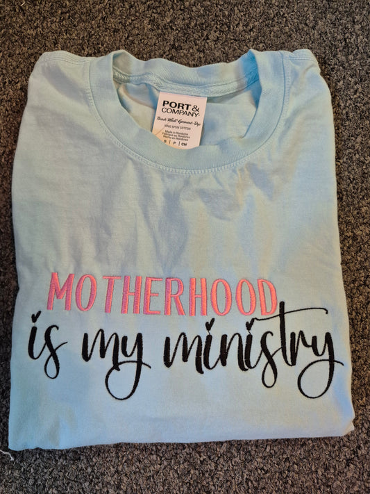 Motherhood Is My Ministry Embroidered Port and Company T-Shirt