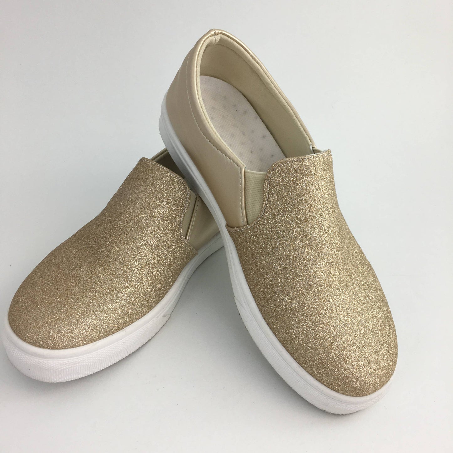 Gold sparkle slip on sneakers