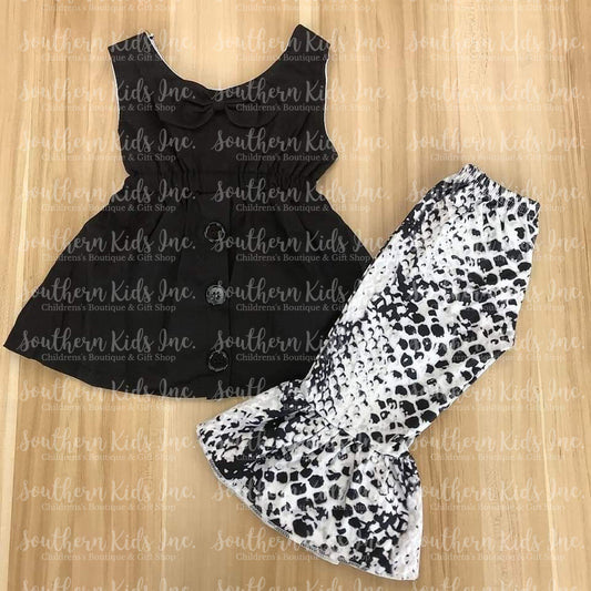 Black Sleeveless Shirt and Black and White Snakeskin Bell Bottom Pants